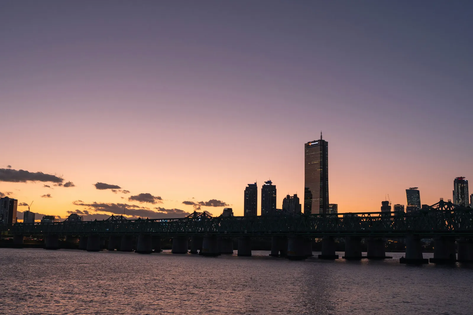 The Seoul skyline across the Han River at sunset